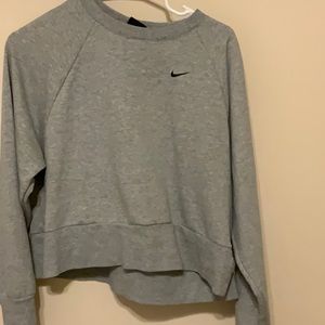Grey nike cropped sweatshirt.